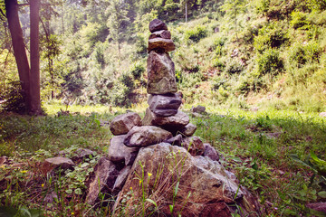 Rocks stones zen installation in summer nature in Bohemia