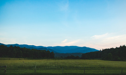 Scenic landscape in a mountain valley at sunset