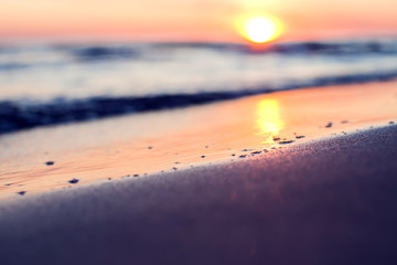 A sunset on the beach. Sea and eveninig sky with clouds