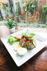 stir-fried rice with green curry and boiled egg ,thai  food