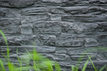 The surface of the decorative stone. Imitation stone wall