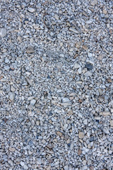 Background of stones. Piece of pebble beach.