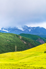 Fototapeta na wymiar The North-Chuyskiy ridge and power lines. Gorny Altai, Russia