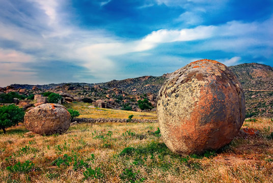 TINOS ISLAND, CYCLADES, AEGEAN SEA, GREECE. Surreal landscape with huge, round and smooth rocks close to Volax (or "Volakas") village.