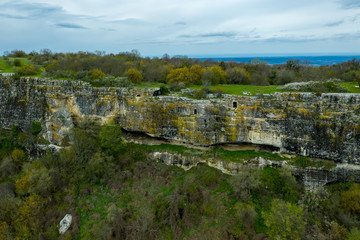 Fototapeta na wymiar Cave city Mangup-Kale, near the city of Bakhchisaray, Crimea. Aerial drone view