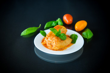 stuffed pepper with meat and vegetable sauce in a plate