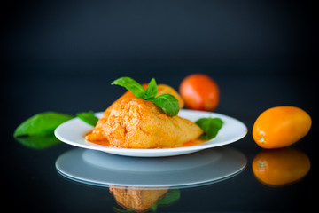 stuffed pepper with meat and vegetable sauce in a plate