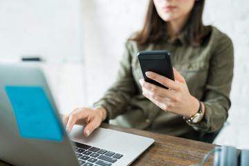 Businesswoman Using Technology At Workplace