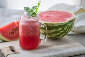Photo of watermelon smoothie in jar with straw on light background. Fresh organic Smoothie. Health or detox diet food concept. - 280787359