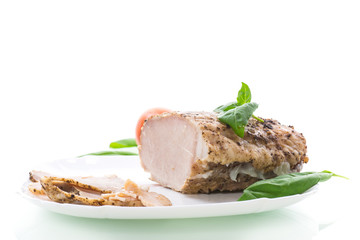 homemade baked meat with spices in a plate