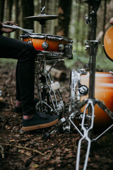 drummer plays in the forest