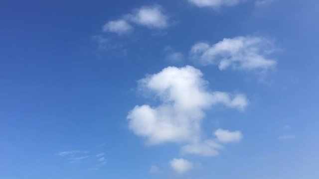 Time lapse video at noon, with the sky bright blue and white. Beautiful cloud movement during the day in very hot weather. Sky weather time lapse video with cloudy weather suitable for background.
