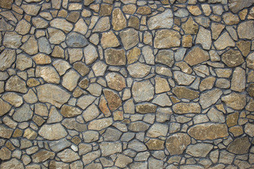 Texture of a stone wall. Old castle stone wall texture background. Part of a stone wall, for background or texture