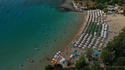 Aerial drone photo of famous organised sandy paradise beach of Kalogria in the heart of Messinian Mani next to iconic village of Stoupa, Peloponnese, Greece