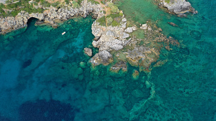 Aerial drone panoramic photo of iconic picturesque village and sandy beach of Stoupa in the heart of Messinian Mani, Peloponnese, Greece