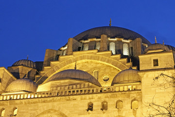 Fototapeta na wymiar Domes of Suleymaniye Mosque night view, the largest in the city, Istanbul, Turkey