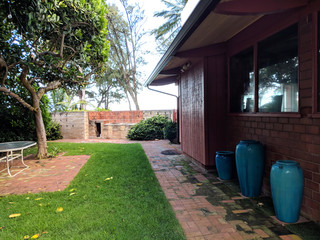 Red Brick Patio with BBQ Pits