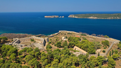 Fototapeta na wymiar Aerial drone photo of iconic medieval castle and village of Pylos or Pilos in the heart of Messinia prefecture, Peloponnese, Greece