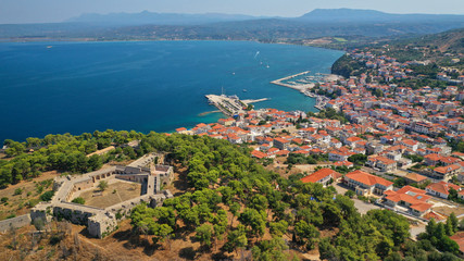 Naklejka premium Aerial drone photo of iconic medieval castle and village of Pylos or Pilos in the heart of Messinia prefecture, Peloponnese, Greece