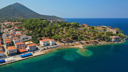 Fototapeta premium Aerial drone photo of iconic medieval castle and village of Pylos or Pilos in the heart of Messinia prefecture, Peloponnese, Greece