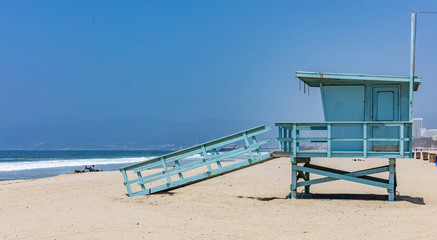 Lifeguard hut on Santa Monica beach. Pacific ocean coastline Los Angeles USA.