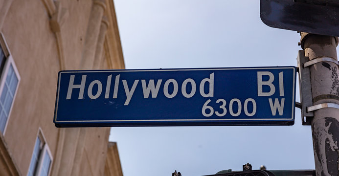 Hollywood Bl. LA, California, USA. Blue road sig,  blue sky background