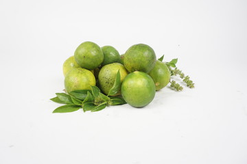 fresh limes on white background