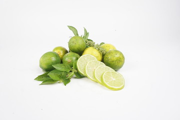 limes on white background
