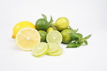 lemons with leaves on white background
