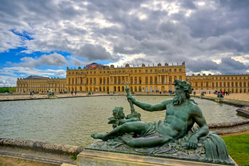 Versailles, France - April 24, 2019: The statues and fountains in and around the garden of...