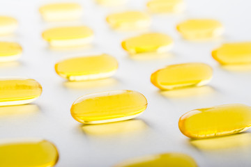 Vitamin, essential oils, dietary supplement yellow pills