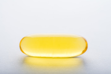 Vitamin, essential oils, dietary supplement yellow pill