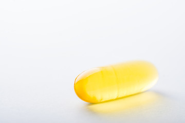 Vitamin, essential oils, dietary supplement yellow pill