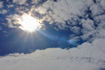 Fantastic soft white clouds against blue sky on background