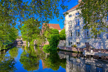The canals of Bruges (Brugge), Belgium on a sunny day.