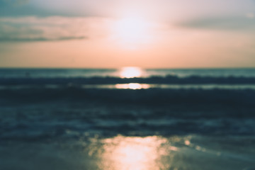 Tropical nature clean beach and white sand in summer with sun light blue sky and bokeh background.