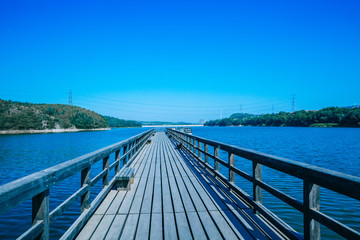 Obraz premium Trestle reaching into the water, waterside, marina