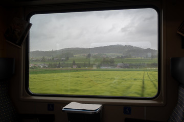 View of rural area of Switzerland look from intercity train for background with copy space