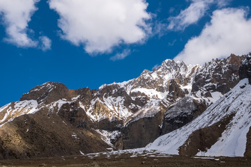 Fototapeta na wymiar Caucasus Mountains under the blue sky