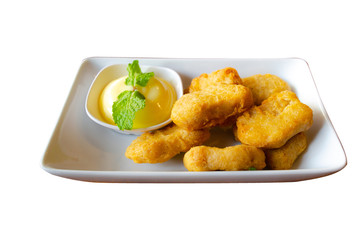 Chicken nuggets on white dish isolated  background,clipping path.