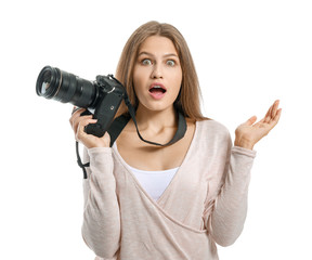 Shocked female photographer on white background