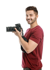 Young male photographer on white background