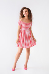 Beautiful African-American woman on white background