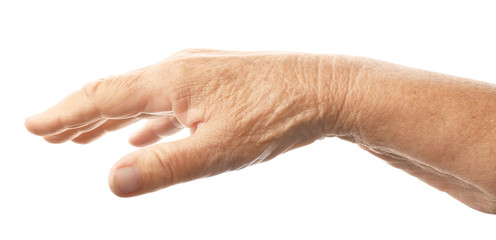 Hand of elderly woman on white background