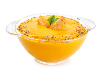 Bowl of tasty cream soup on white background