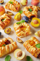 Homemade puff pastry pies with fruit