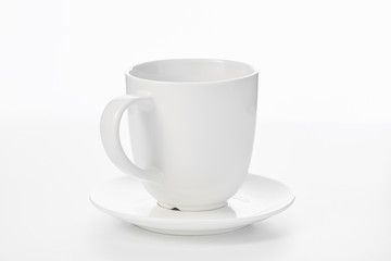 Empty white cup isolated on white