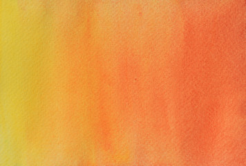 Watercolor stroke and spray on white paper , Abstract background by hand drawn brown with orange and yellow  liquid drip