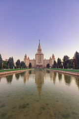 Pond in front of the Moscow State University in the evening against the sky