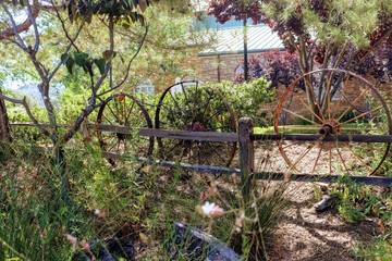 Vintage wagon wheels in garden